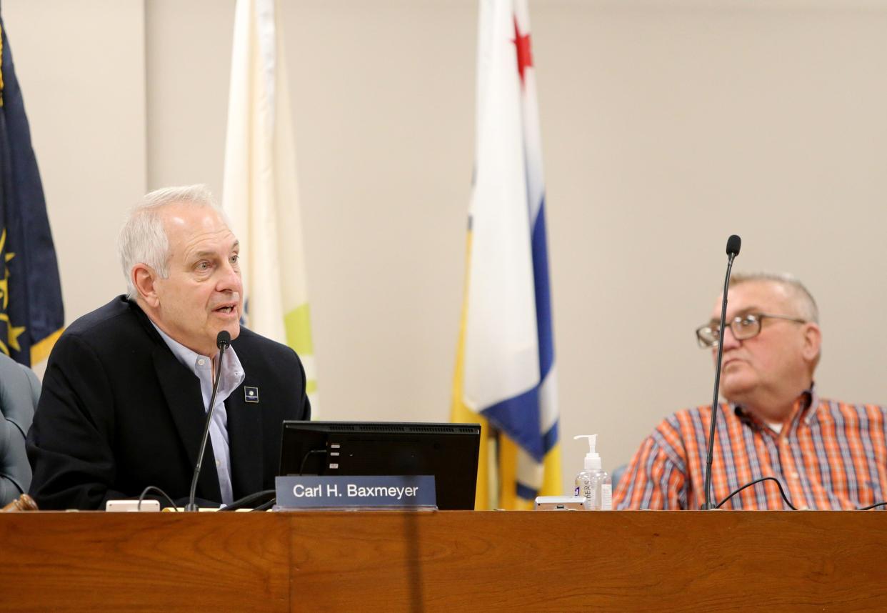 From left, Carl Baxmeyer, St. Joseph County Commissioners president, speaks Feb. 20, 2024, at the commissioners meeting in the County-City Building in South Bend, as Commissioner Tony Hazen listens.