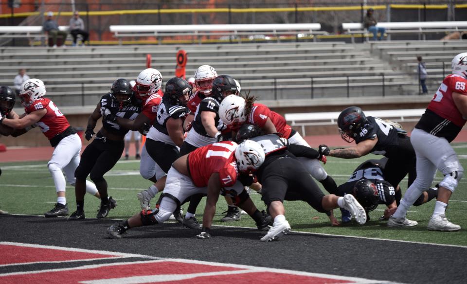 Isaiah Williams powers in a one-yard touchdown run.