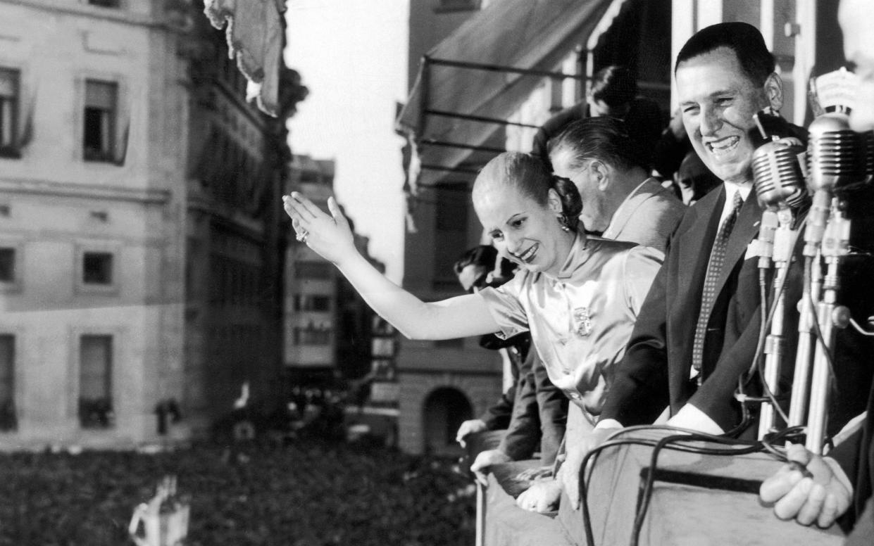 Eva and Juan Perón greeting crowds from the presidential balcony in Buenos Aires, 1950 - Getty