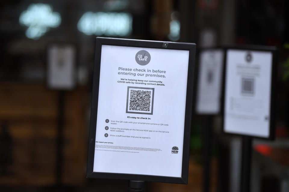 QR check in signage at an entertainment venue at Barangaroo in Sydney, Sunday, October 10, 2021. 