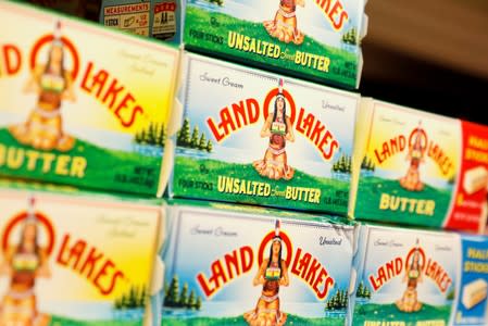 FILE PHOTO: Packages of Dean Foods brand, Land O'Lakes butter are displayed in a supermarket in New York