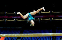 Australian gymnast Ashleigh Brennan runs through her beam routine during podium training at North Greenwich Arena in London, Thursday, July 26, 2012. (AAP Image/Tracey Nearmy) NO ARCHIVING