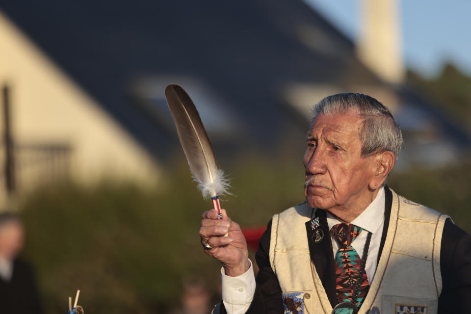 WWII veteran Charles Shay, 97 pays tribute to soldiers during a D-Day commemoration ceremony of the 78th anniversary for those who helped end World War II, in Saint-Laurent-sur-Mer, Normandy, France, Monday, June 6, 2022. (AP Photo/ Jeremias Gonzalez)