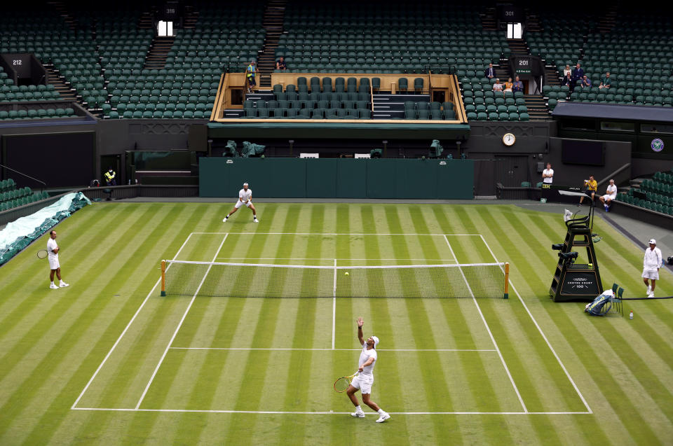 Rafa Nadal and Matteo Berrettini, pictured here practicing on Centre Court at Wimbledon.