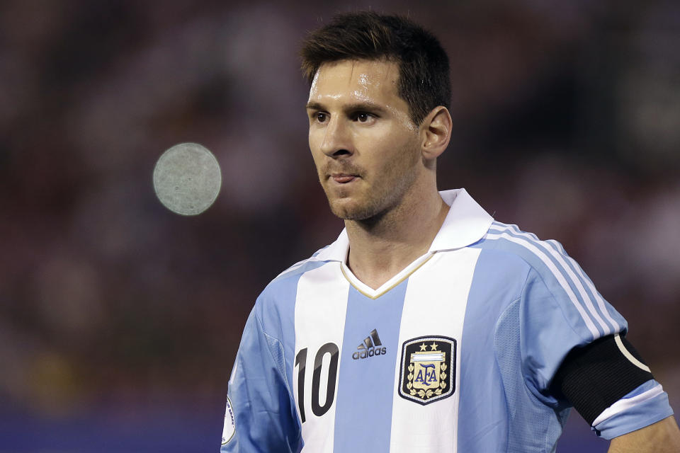 FILE - The Sept. 10, 2013 file photo shows Argentina's Lionel Messi on during a 2014 World Cup qualifying soccer game against Paraguay in Asuncion, Paraguay. Brazilian fans hoping for a home-team win at this year's World Cup are hoping just as hard that archrival Argentina does not lift the trophy.(AP Photo/Andre Penner, File)