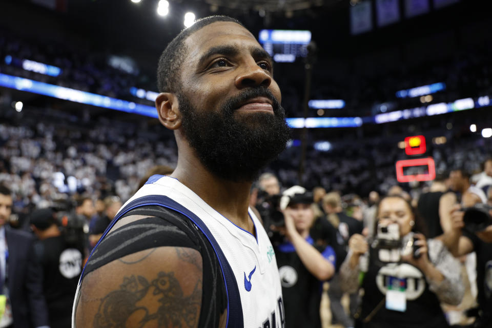 MINNEAPOLIS, MINNESOTA - MAY 30: Kyrie Irving #11 of the Dallas Mavericks celebrates after a 124-103 victory against the Minnesota Timberwolves in Game Five of the Western Conference Finals at Target Center on May 30, 2024 in Minneapolis, Minnesota. NOTE TO USER: User expressly acknowledges and agrees that, by downloading and or using this photograph, User is consenting to the terms and conditions of the Getty Images License Agreement. (Photo by David Berding/Getty Images)