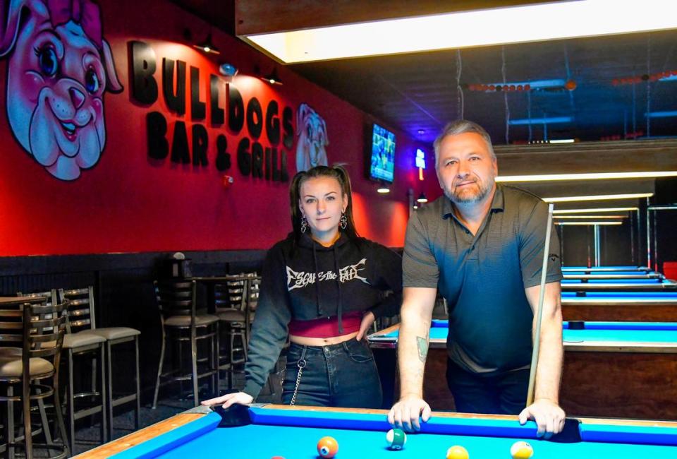 Owner John Boutwell and his daughter Sarah at Bulldogs Bar and Grill at 3750 Bloomfield Village Drive in Macon.