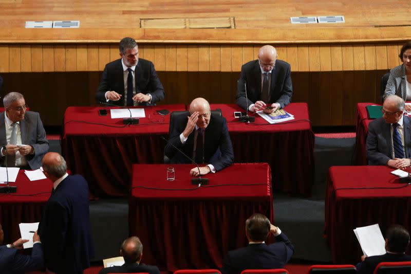 Lebanese PM Najib Mikati gestures as he attends a parliamentary session at UNESCO Palace in Beirut