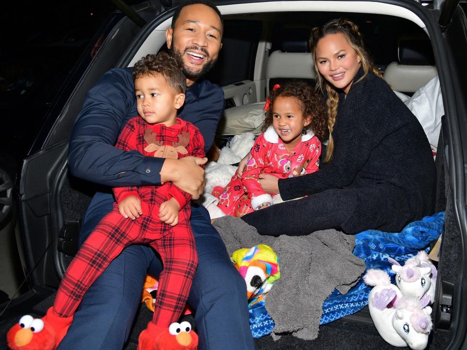 John Legend and Chrissy Teigen with children