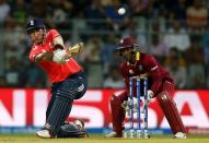 Cricket - West Indies v England - World Twenty20 cricket tournament - Mumbai, India, 16/03/2016. England's Jason Roy plays (L) a shot watched by West Indies wicketkeeper Denesh Ramdin. REUTERS/Danish Siddiqui