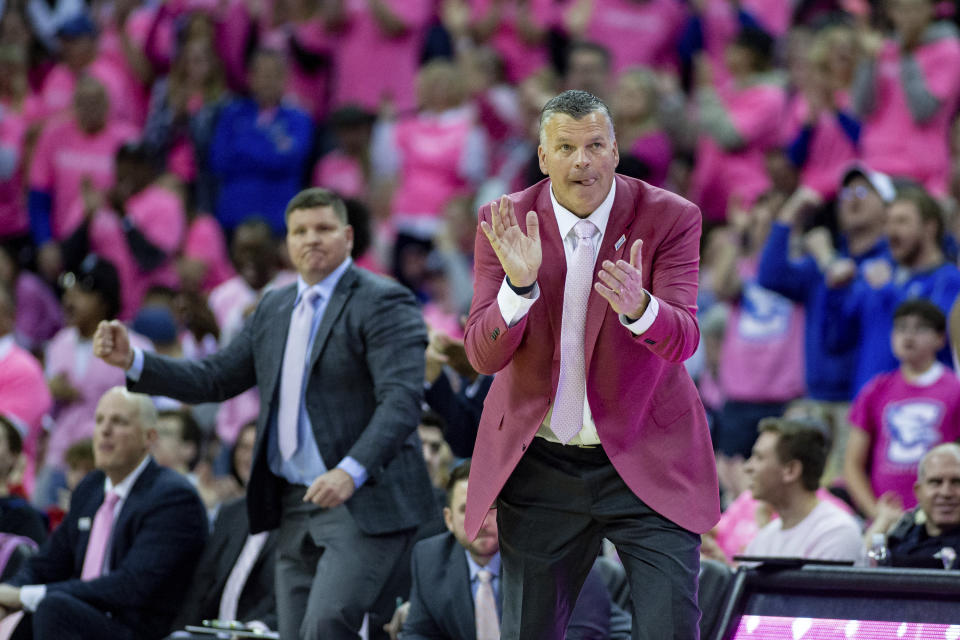 Creighton head coach Gregg McDermott cheers his team on in the second half during an NCAA college basketball game against Xavier, Saturday, Jan. 28, 2023, in Omaha, Neb. (AP Photo/John Peterson)