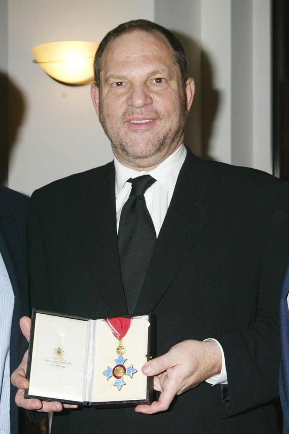 Harvey Weinstein received his CBE at an investiture ceremony at the British Consul in New York in 2004 (PA)