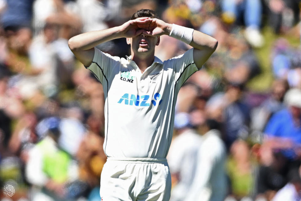 New Zealand's Matt Henry covers his eyes after bowling to Australia's Cameron Green on the second day of their cricket test match in Wellington, New Zealand, Friday March 1, 2024. (Kerry Marshall/Photosport via AP)