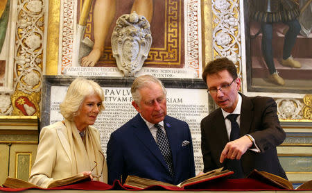 Britain's Prince Charles and his wife Camilla, Duchess of Cornwall arrive to visit the Vatican Apostolic Library at the Vatican, April 4, 2017. REUTERS/Alessandro Bianchi