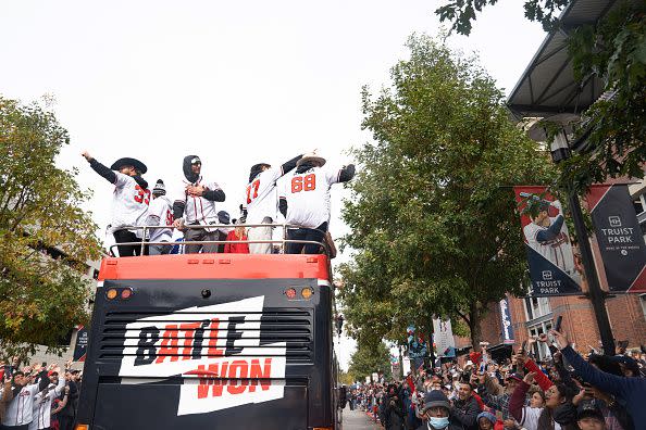 ATLANTA, GA - NOVEMBER 05: Fans cheer for the Atlanta Braves during the World Series Parade at Truist Park on November 5, 2021 in Atlanta, Georgia. The Atlanta Braves won the World Series in six games against the Houston Astros winning their first championship since 1995. (Photo by Megan Varner/Getty Images)