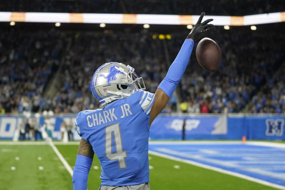 Detroit Lions wide receiver DJ Chark (4) reacts after his 41-yard pass reception during the first half of an NFL football game against the Jacksonville Jaguars, Sunday, Dec. 4, 2022, in Detroit. (AP Photo/Paul Sancya)