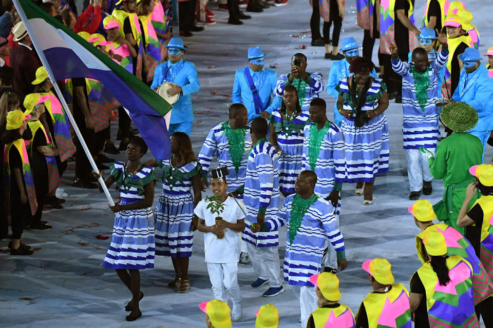 <p>The bold blue-and-white striped A-line dresses were more Miu Miu Fall 2015 than locker room. </p><p><i>(Photo: Getty Images)</i><br></p>