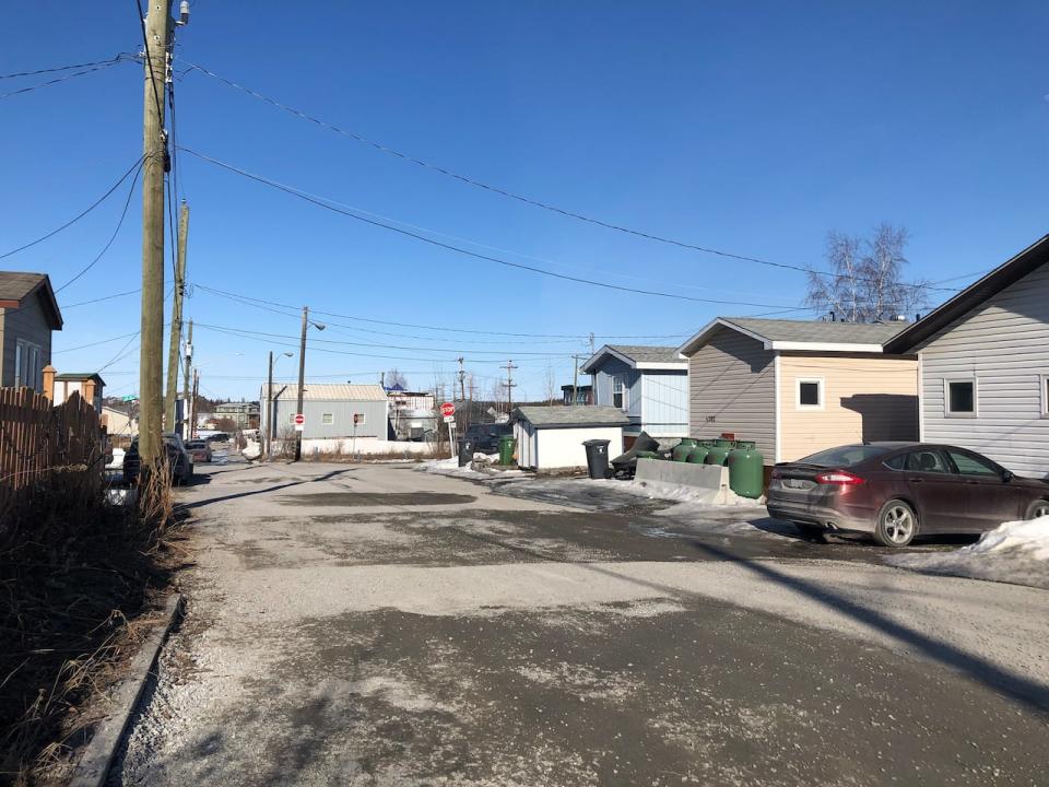 A photo of the 49A Avenue in Yellowknife. Alexandra Giroux, who lives on the street, says the gravel patches are various repairs to water mains. 