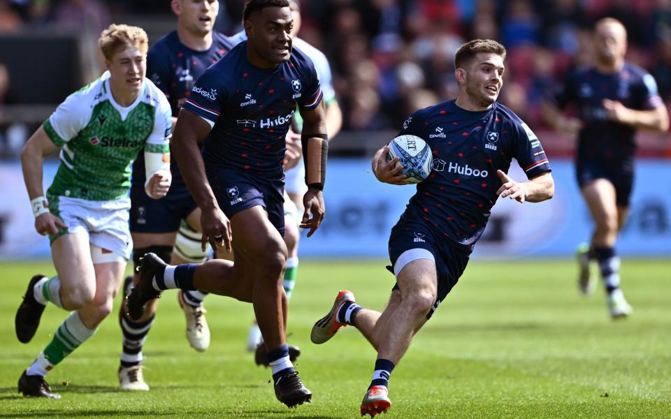 Harry Randall runs with the ball against Newcastle Falcons