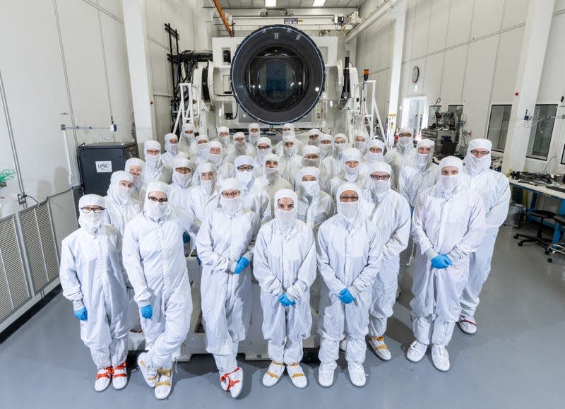 Most of the LSST Camera crew in the clean room with the instrument. - Photo: Jacqueline Ramseyer Orrell/SLAC National Accelerator Laboratory