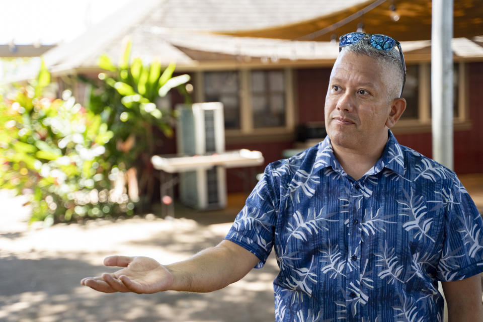 Maui Preparatory Academy head Dr. Miguel Solis is pictured during an interview on Tuesday, Oct. 3, 2023, in Lahaina, Hawaii. At one point the academy had taken in about 150 public school students. The three public schools that survived the deadly August wildfire are set to reopen this week. (AP Photo/Mengshin Lin)