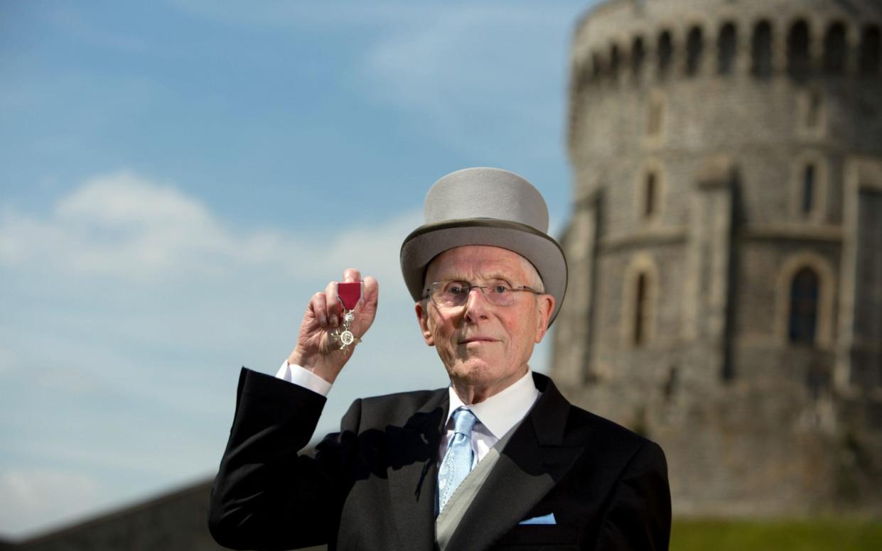 Ayers, chief of aerodynamics with the Bloodhound supersonic car project, with his MBE for services to engineering, Windsor, 2014