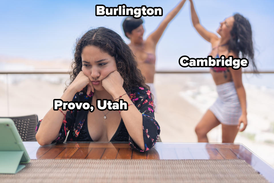 woman sulking at a table marked provo, utah with two people marked burlington and cambridge high-five in the background