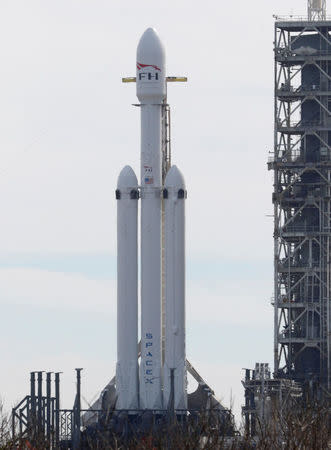 A SpaceX Falcon Heavy rocket stands on historic launch pad 39A as it is readied for its first demonstration flight at the Kennedy Space Center in Cape Canaveral, Florida, U.S., February 5, 2018. REUTERS/Joe Skipper