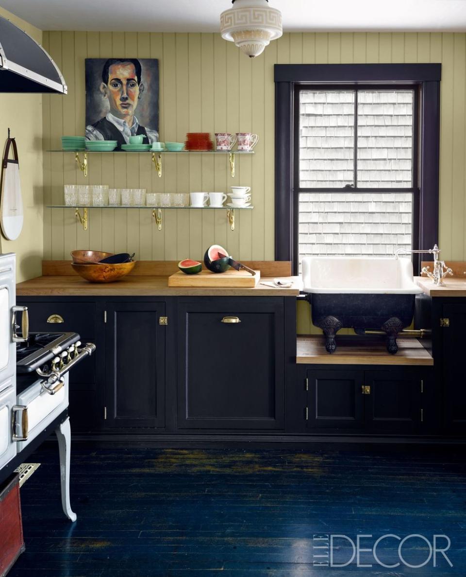 <p>In the kitchen of designer <a rel="nofollow noopener" href="https://www.elledecor.com/design-decorate/house-interiors/news/g2581/house-tour-ken-fulk/?slide=7" target="_blank" data-ylk="slk:Ken Fulk's Victorian cottage;elm:context_link;itc:0;sec:content-canvas" class="link ">Ken Fulk's Victorian cottage</a> the custom-made cabinetry is painted in Tanner's Brown, and the walls are in Cream, both by <a rel="nofollow noopener" href="http://us.farrow-ball.com/" target="_blank" data-ylk="slk:Farrow & Ball;elm:context_link;itc:0;sec:content-canvas" class="link ">Farrow & Ball</a>; the countertops are butcher block, and the <a rel="nofollow noopener" href="http://www.wedgwood.com/" target="_blank" data-ylk="slk:Wedgewood;elm:context_link;itc:0;sec:content-canvas" class="link ">Wedgewood</a> stove is antique.</p>