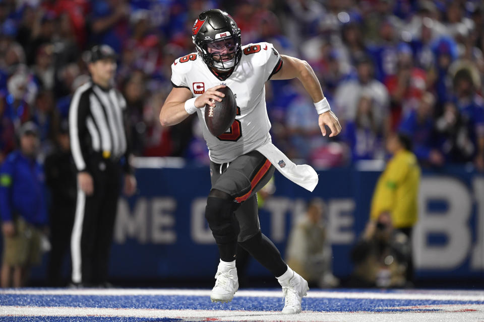 Tampa Bay Buccaneers quarterback Baker Mayfield (6) scrambles in the second half of an NFL football game against the Buffalo Bills, Thursday, Oct. 26, 2023, in Orchard Park, N.Y. (AP Photo/Adrian Kraus)