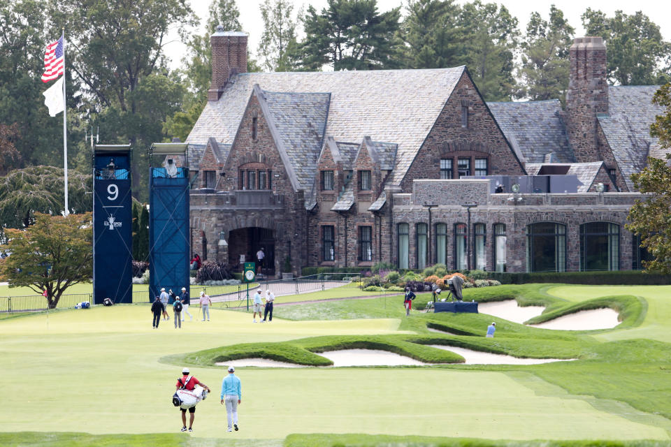 MAMARONECK, NEW YORK - SEPTEMBER 16: Rory McIlroy of Northern Ireland walks with his caddie Harry Diamond on the ninth hole during a practice round prior to the 120th U.S. Open Championship on September 16, 2020 at Winged Foot Golf Club in Mamaroneck, New York. (Photo by Jamie Squire/Getty Images)