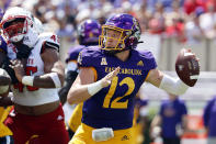 East Carolina's Holton Ahlers (12) looks to pass the ball against North Carolina State during the first half of an NCAA college football game in Greenville, N.C., Saturday, Sept. 3, 2022. (AP Photo/Karl B DeBlaker)