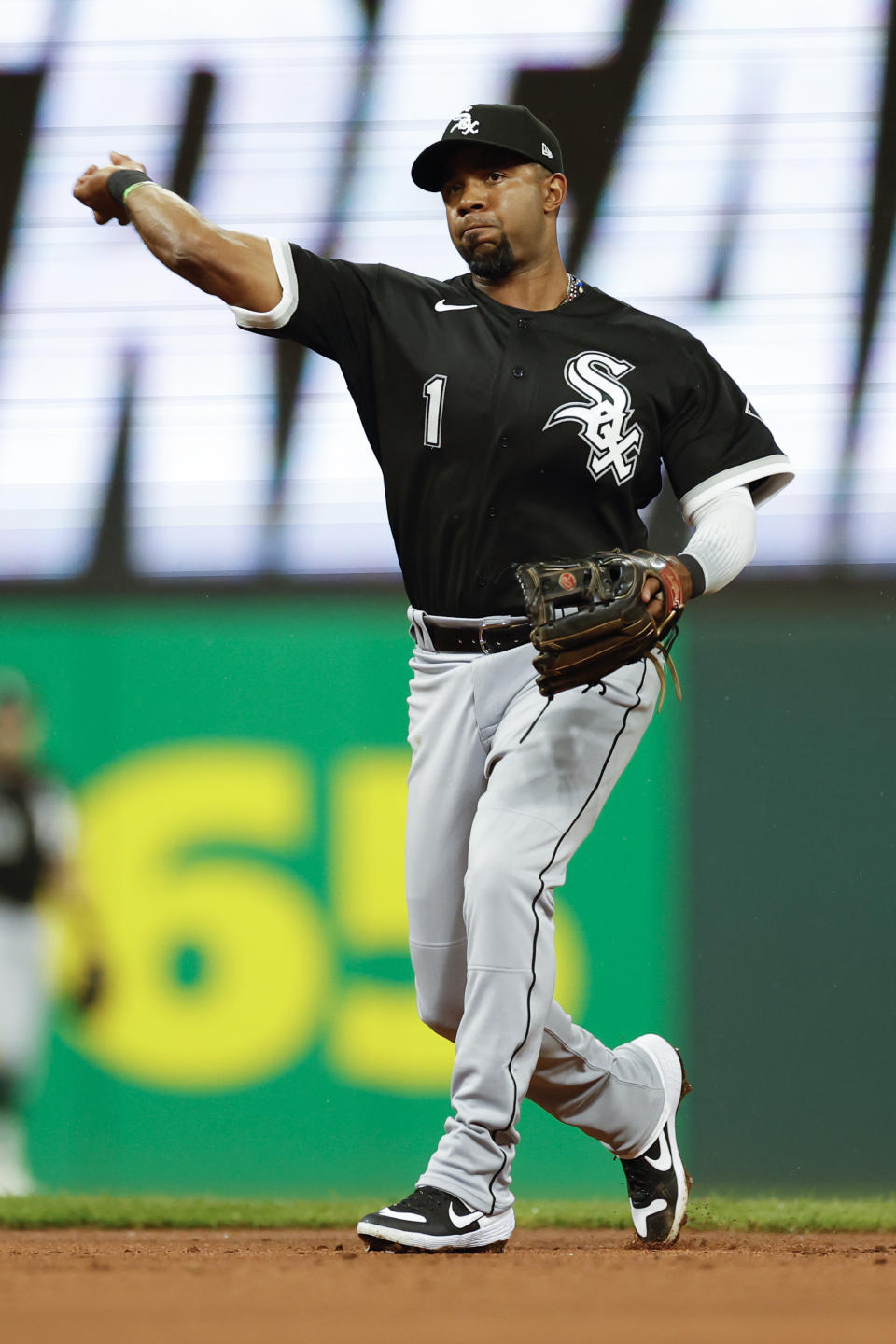 Chicago White Sox shortstop Elvis Andrus throws out Cleveland Guardians' Josh Naylor at first base during the second inning of a baseball game Saturday, Aug. 20, 2022, in Cleveland. (AP Photo/Ron Schwane)