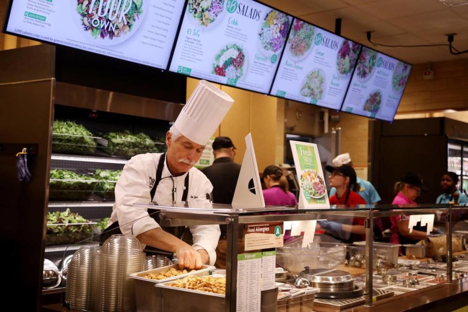 Wegmans grocery store in Raleigh has several specialty sections including this salad bar that was being stocked on Friday, Sept. 27, 2019.