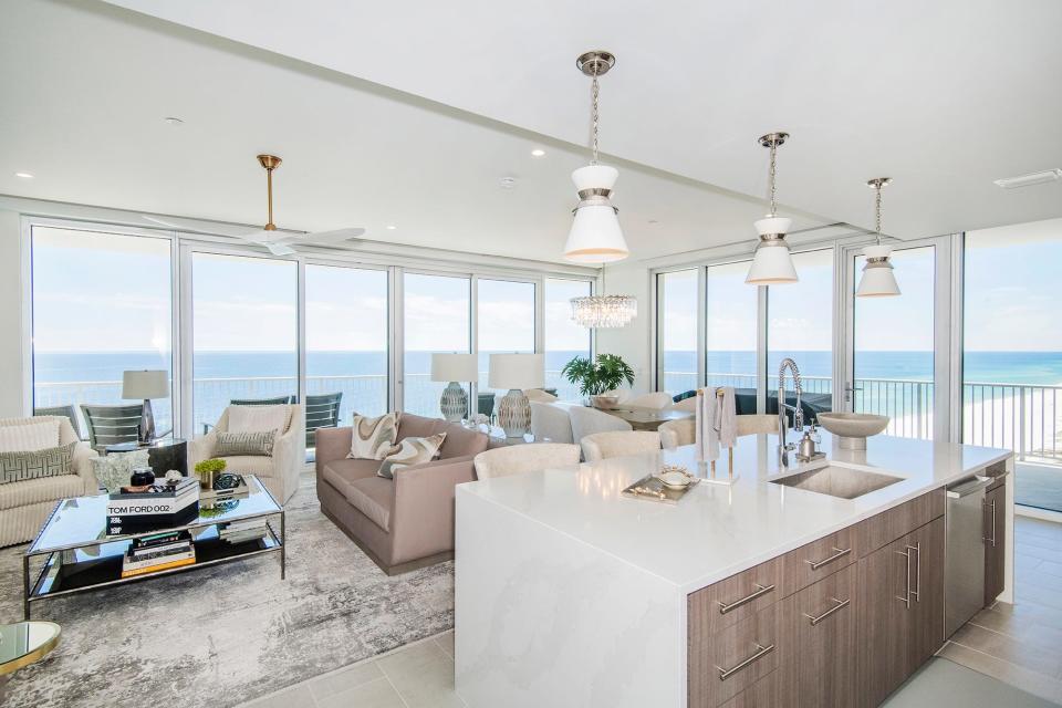 The condo features a wall of sliding glass doors overlooking the Gulf.