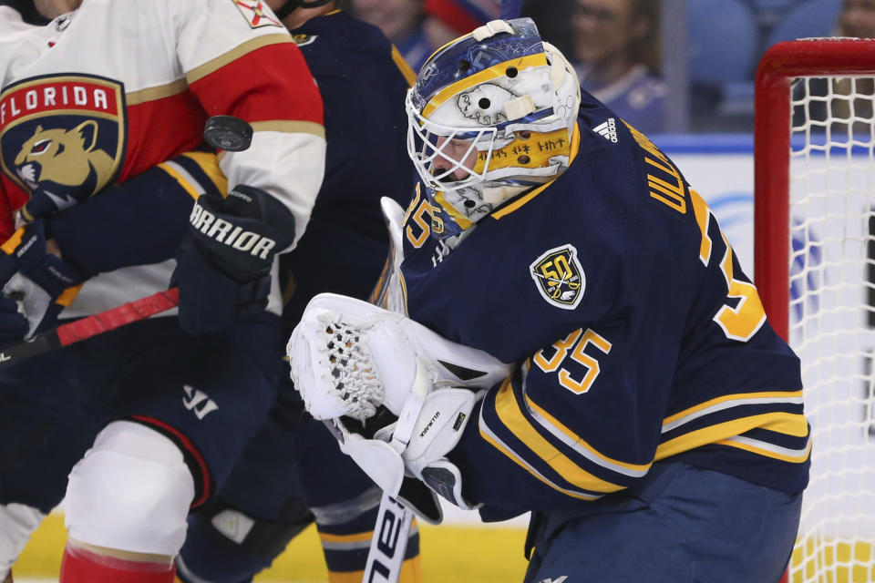 Buffalo Sabres goalie Linus Ullmark (35) stops the puck during the second period of an NHL hockey game against the Florida Panthers, Saturday, Jan. 4, 2020, in Buffalo, N.Y. (AP Photo/Jeffrey T. Barnes)