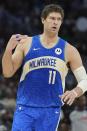 Milwaukee Bucks' Brook Lopez celebrates his three pointer during the first half of an NBA basketball game Thursday, March 21, 2024, in Milwaukee. (AP Photo/Morry Gash)