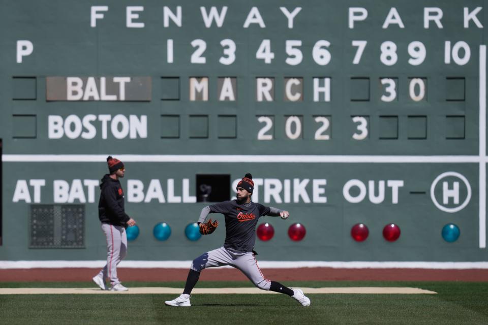 Baltimore Orioles relief pitcher Danny Coulombe practices before facing the Boston Red Sox in an opening day baseball game on March 30, 2023, in Boston.