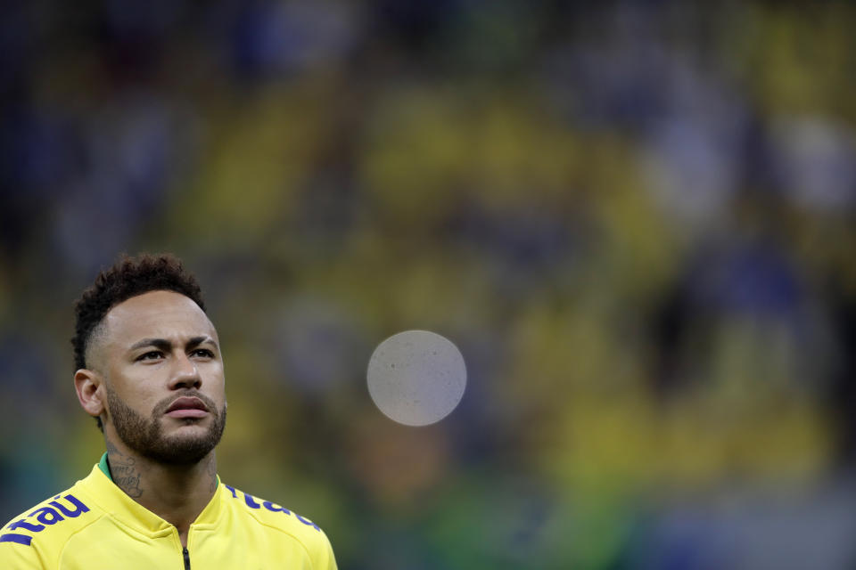 Brazil's Neymar stands on he pitch prior a friendly soccer match against Qatar at the Estadio Nacional in Brasilia, Brazil, Wednesday, June 5, 2019.(AP Photo/Andre Penner)