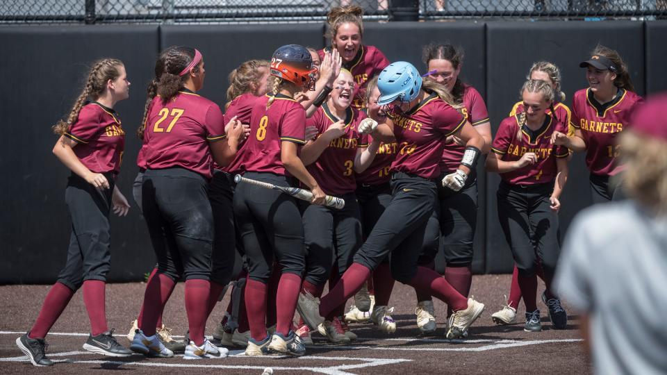 Haddon Heights' Maddy Clark, center, is congratulated by her teammates after Clark hit her 2nd home run of the game during the Group 2 softball championship game between Haddon Heights and Hanover Park played at Ivy Hill Park in Newark on Saturday, June 4, 2022.  Haddon Heights defeated Hanover Park, 4-0.