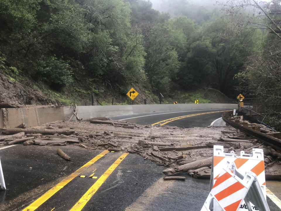 This Friday, Dec. 30, 2022, photo released by California Highway Patrol Dublin Area Office shows Niles Canyon Road closed between Pleasanton Sunol Rd and Fremont near Palomares Rd., in Alameda County, Calif. A landslide has closed a highway in the San Francisco Bay area as crews clear rock and mud debris from Niles Canyon Road, also known as State Route 84, between Fremont and Sunol according to the California Highway Patrol and Caltrans District 4. (CHP Dublin Area Office via AP)