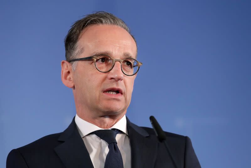 German Foreign Minister Heiko Maas and Turkish Foreign Minister Mevlut Cavusoglu address the media during a joint news conference after a meeting in Berlin