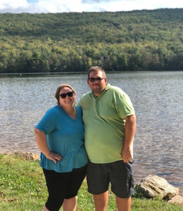 Meghan Megill with her husband before beginning her weight loss journey on Sunday, Oct. 7, 2018.