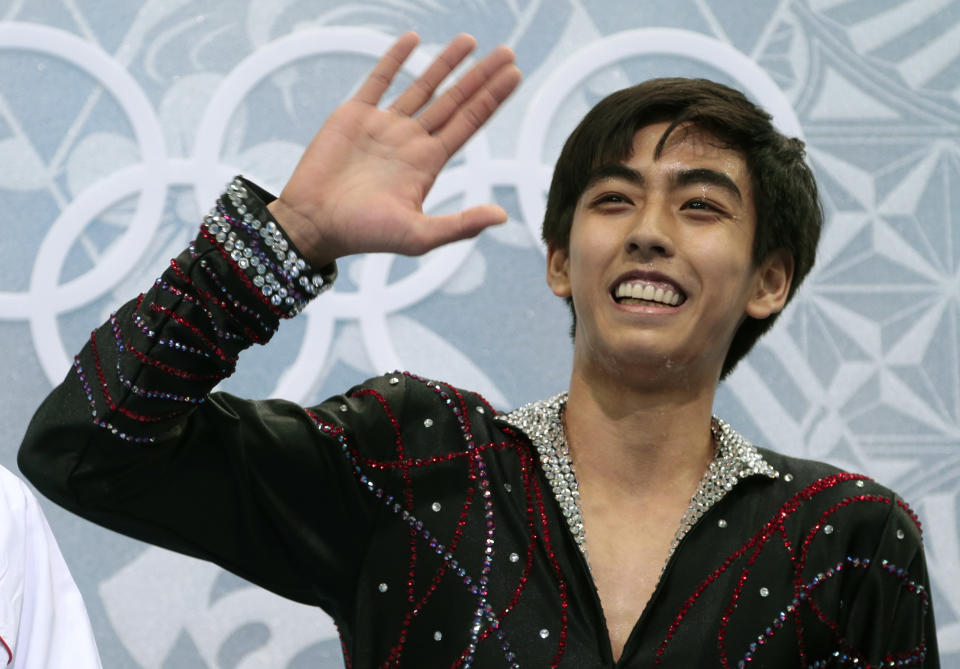 Michael Christian Martinez of the Philippines waves to spectators as he waits for his results after the men's free skate figure skating final at the Iceberg Skating Palace at the 2014 Winter Olympics, Friday, Feb. 14, 2014, in Sochi, Russia. (AP Photo/Ivan Sekretarev)