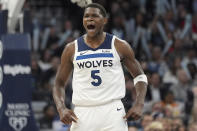 Minnesota Timberwolves guard Anthony Edwards (5) celebrates after making a 3-point shot during the second half of an NBA basketball game agains the Toronto Raptors, Wednesday, April 3, 2024, in Minneapolis. (AP Photo/Abbie Parr)