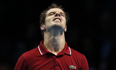 Richard Gasquet of France reacts during his men's singles tennis match against Juan Martin Del Potro of Argentina at the ATP World Tour Finals at the O2 Arena in London November 4, 2013. REUTERS/Suzanne Plunkett