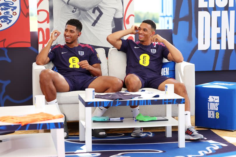 Trent Alexander-Arnold and Jude Bellingham of England react during an England Lions' Den session at Spa & Golf Resort Weimarer Land on June 27, 2024 in Blankenhain, Germany.