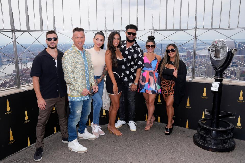 "Jersey Shore Family Vacation" cast members Vinny Guadagnino, Mike "The Situation" Sorrentino, Jenni "JWOWW" Farley, Sammi "Sweetheart" Giancola, Paul "DJ Pauly D" DelVecchio, Deena Nicole Cortese and Nicole "Snooki" Polizzi visit the Empire State Building on Aug. 3, 2023.