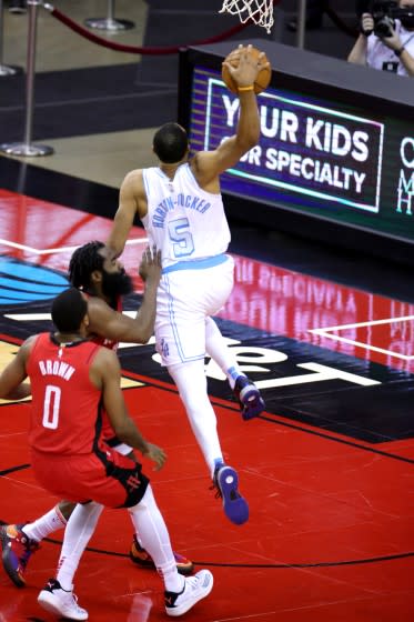 Lakers guard Talen Horton-Tucker goes up for a dunk against the Rockets on Jan. 10, 2021, in Houston.