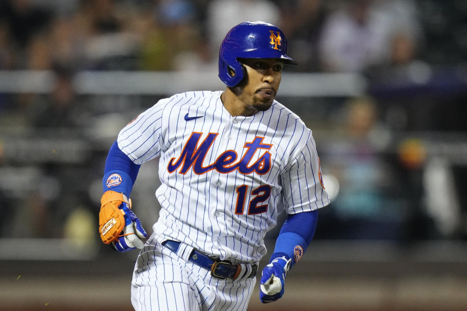 New York Mets' Francisco Lindor (12) runs to first base with an RBI single against the Arizona Diamondbacks during the fifth inning of a baseball game Tuesday, Sept. 12, 2023, in New York. (AP Photo/Frank Franklin II)